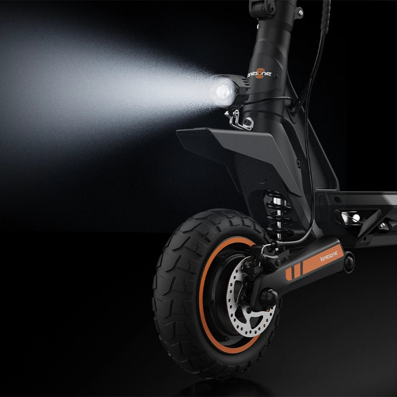 Kingsong N12T3 electric scooter front headlight beam and front wheel detail