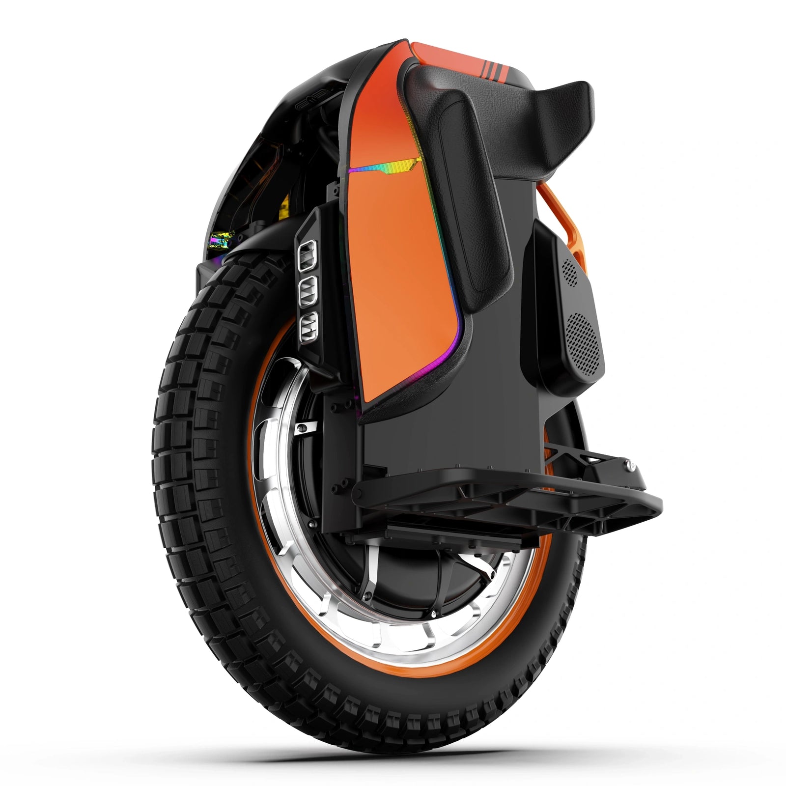 Kingsong S19 Pro electric unicycle parked outside a modern studio at dusk with the black and orange shell visible