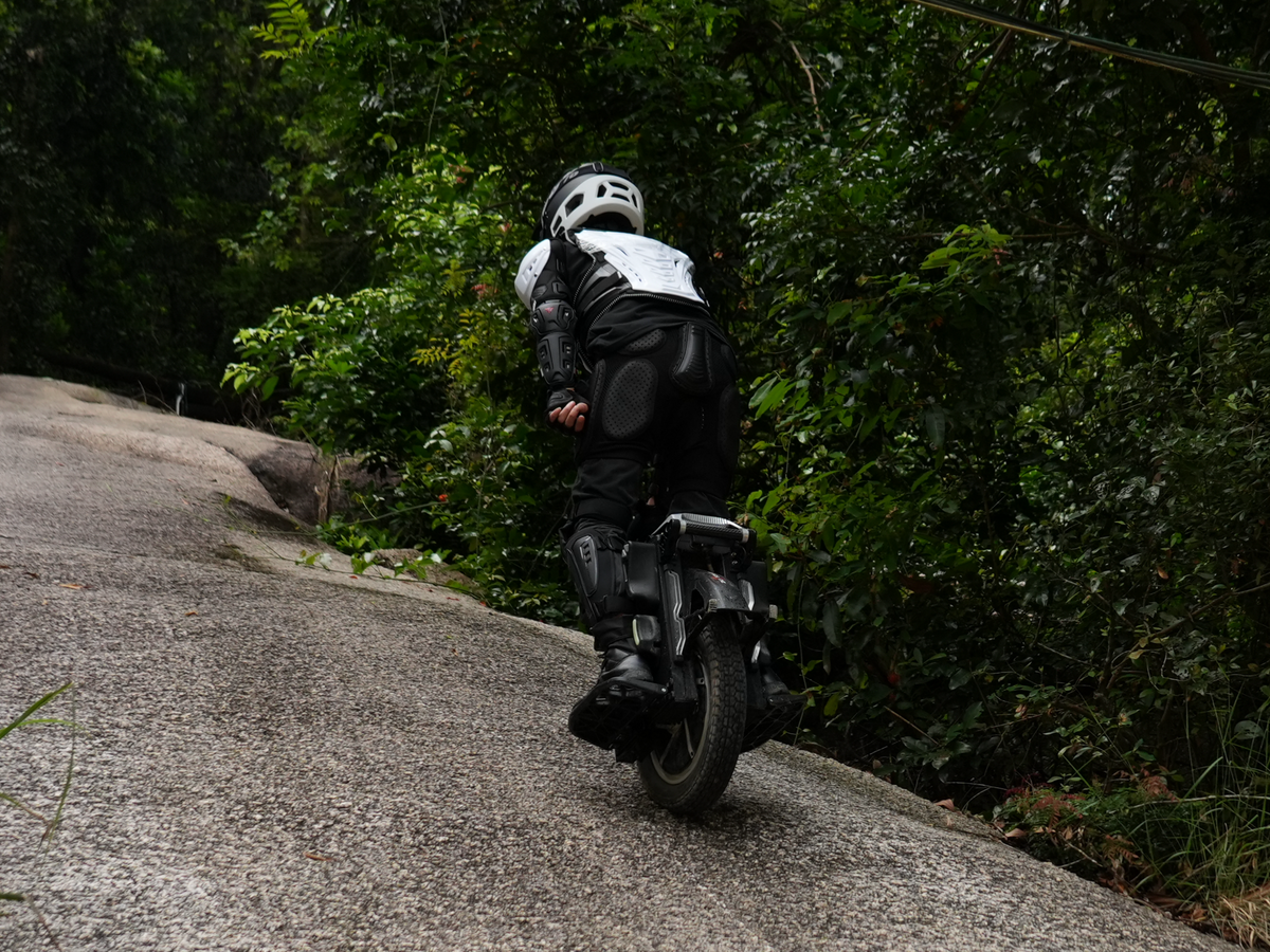 F16 rider climbing a rock surface